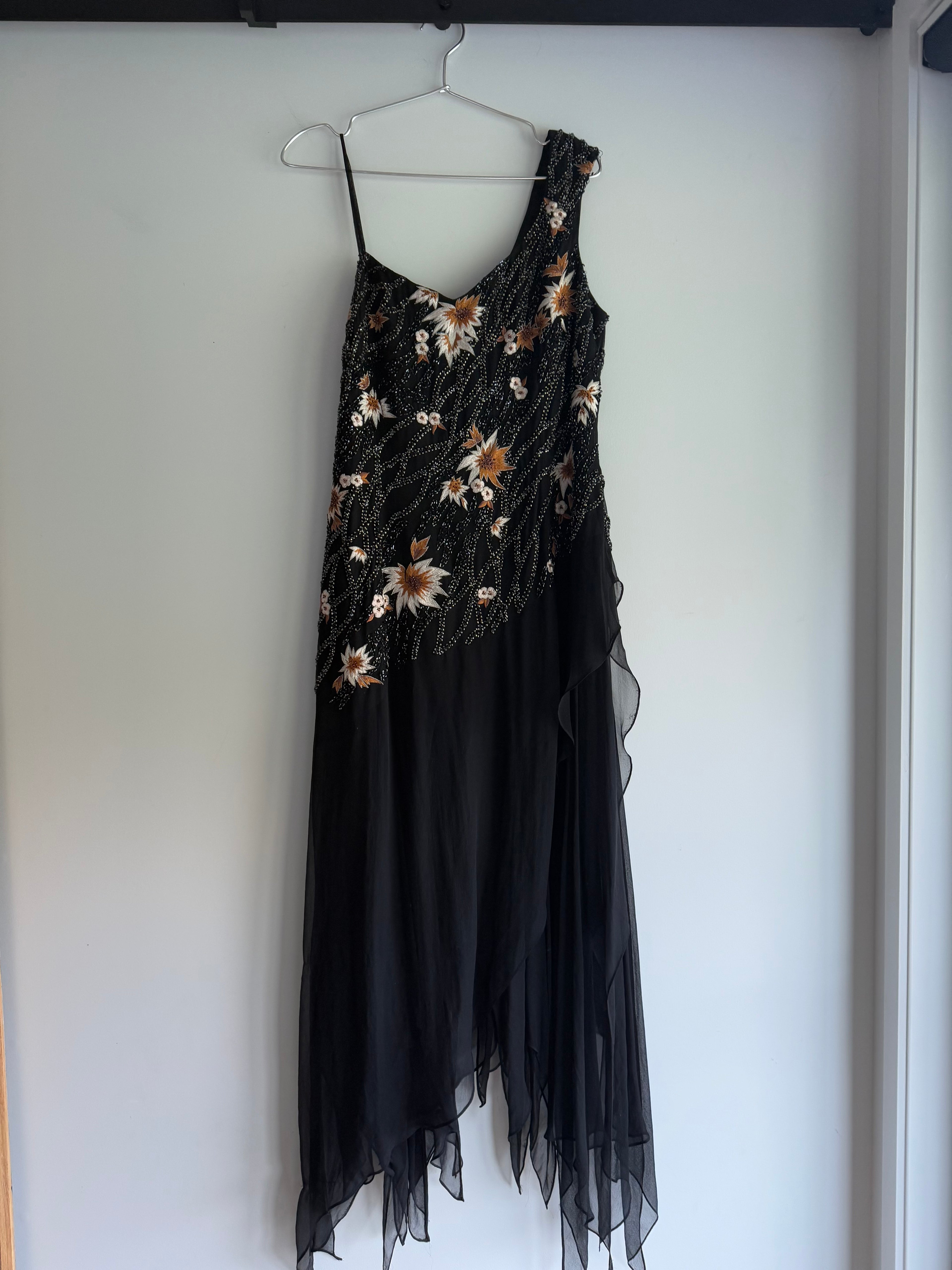 Evening gown with sequins and hanky hem