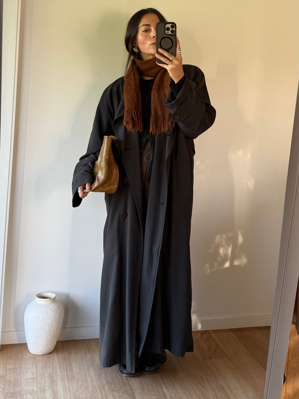 Slouchy black trench coat