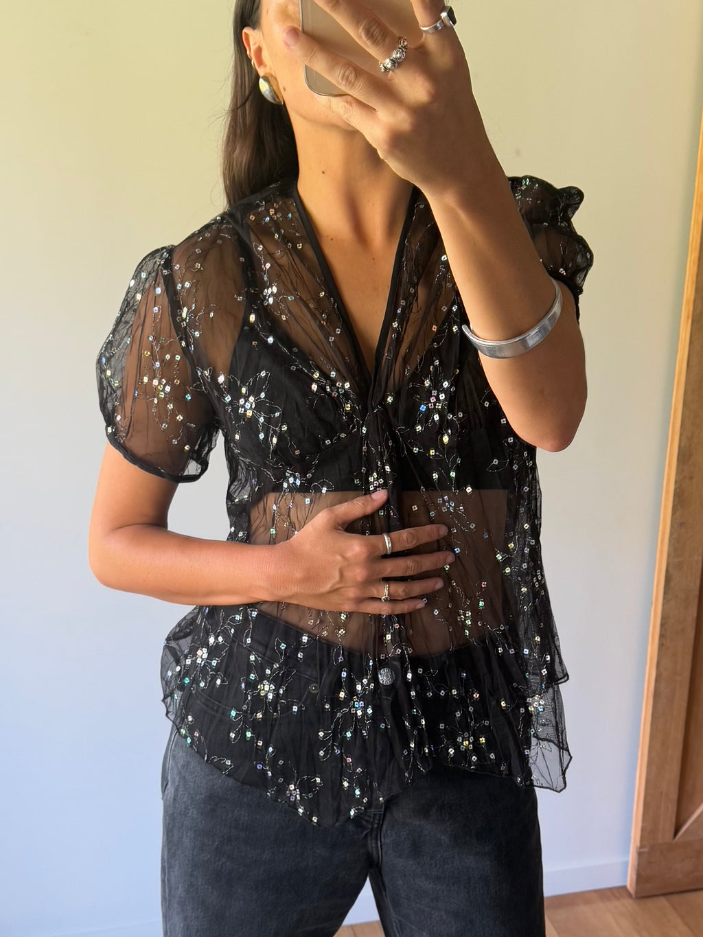 Sheer black top with sequin detail