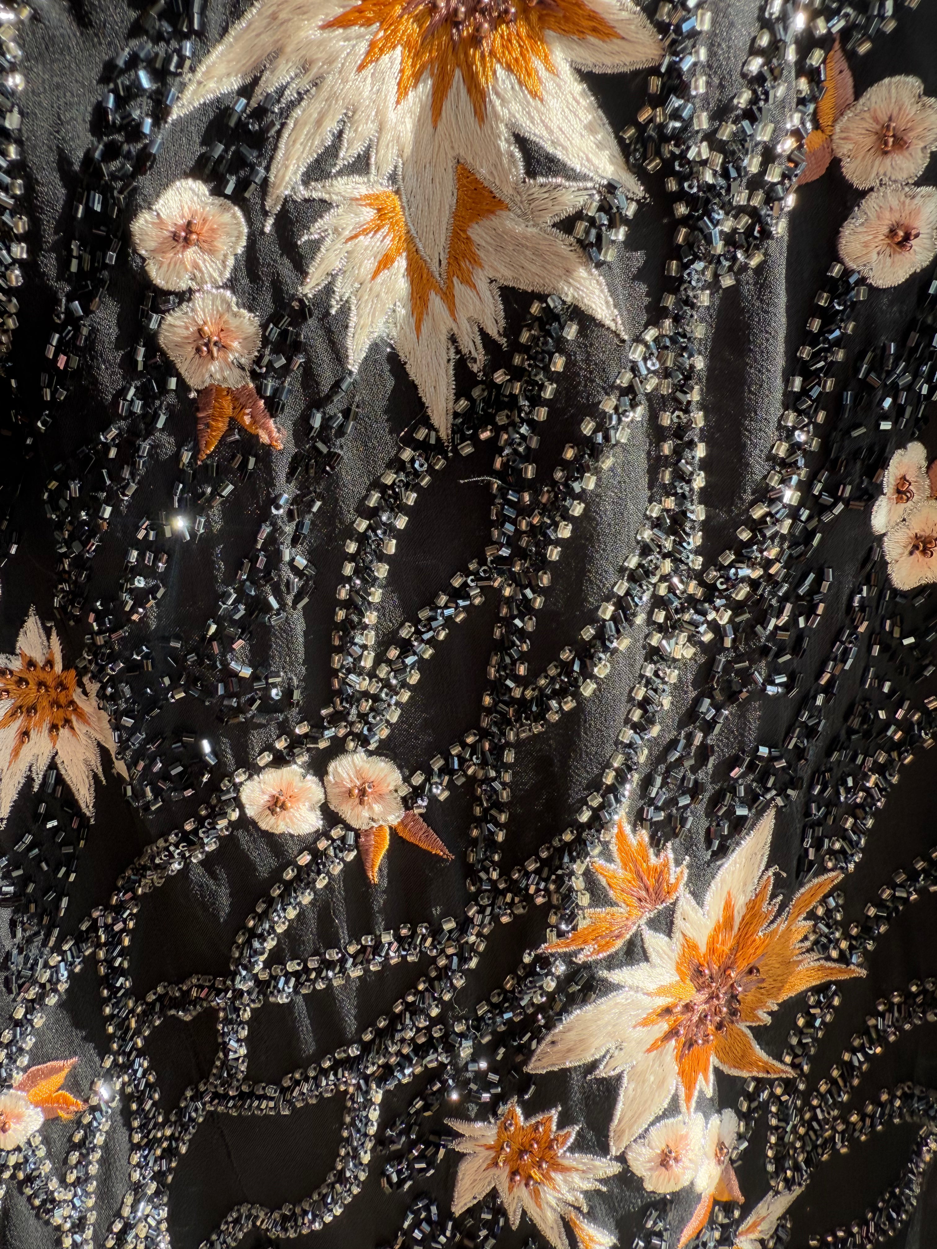 Evening gown with sequins and hanky hem