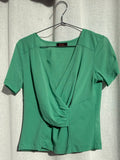Green top with wrap detail