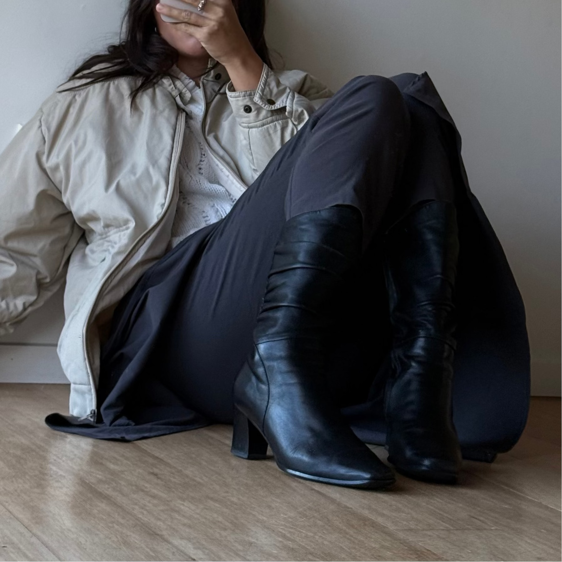 Black leather boots, mid-calf length