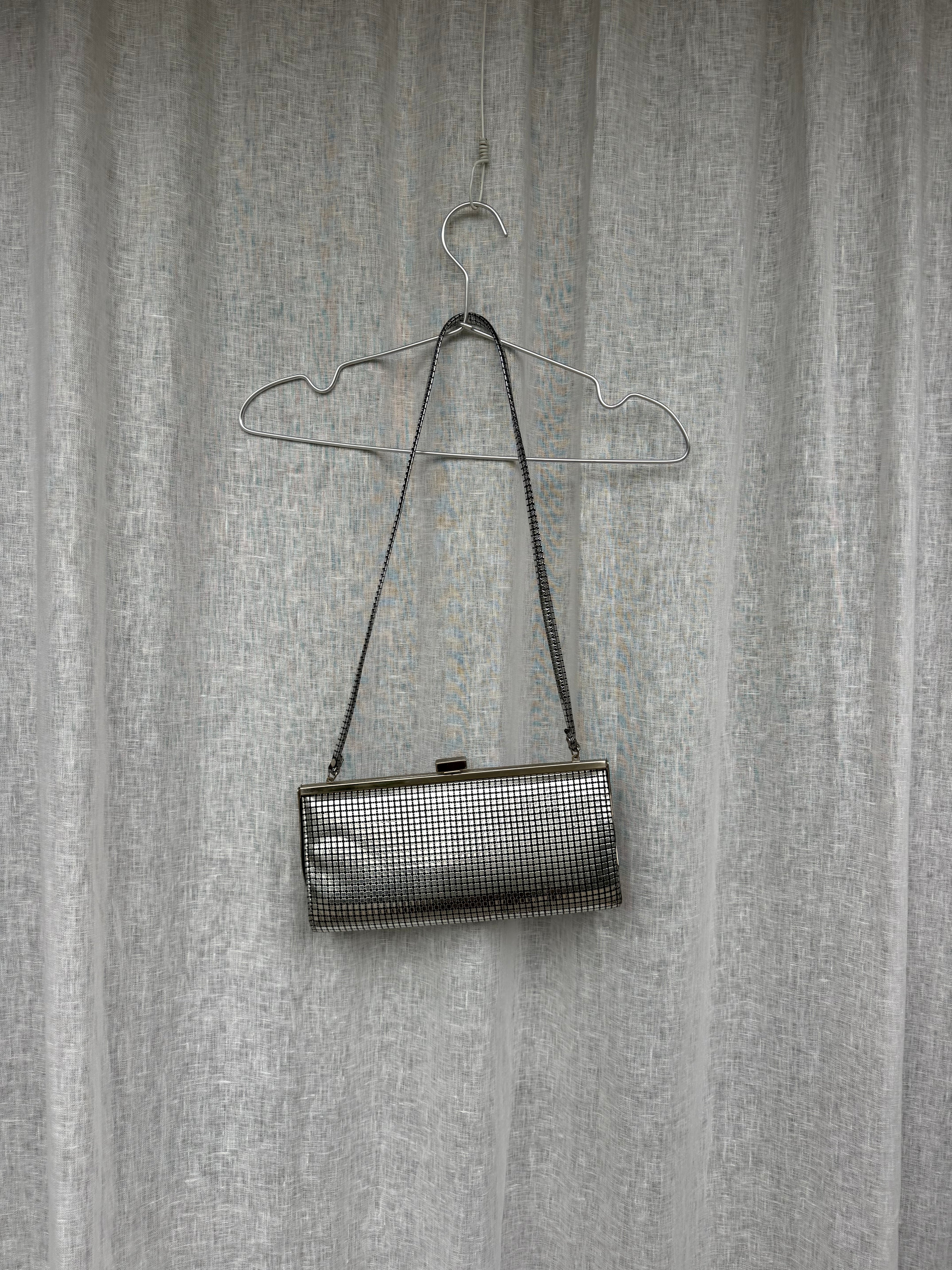 Vintage Eros silver clutch bag