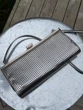 Vintage Eros silver clutch bag