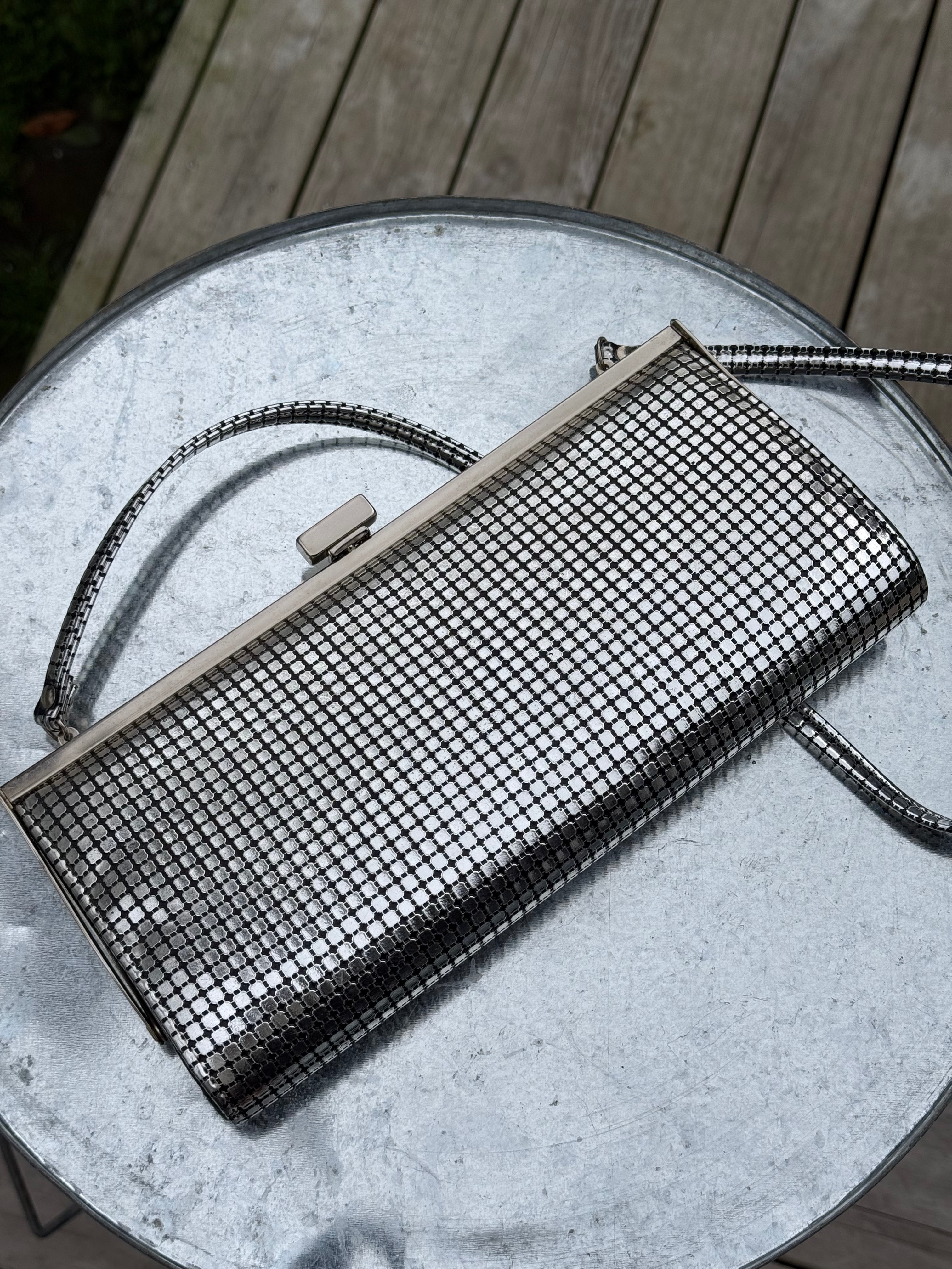 Vintage Eros silver clutch bag