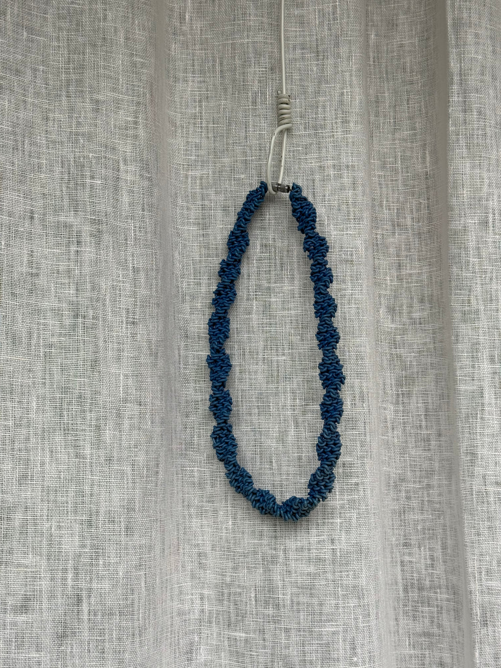 Blue bead necklace