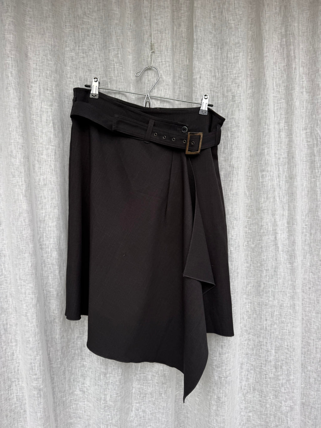 Asymmetric wrap skirt