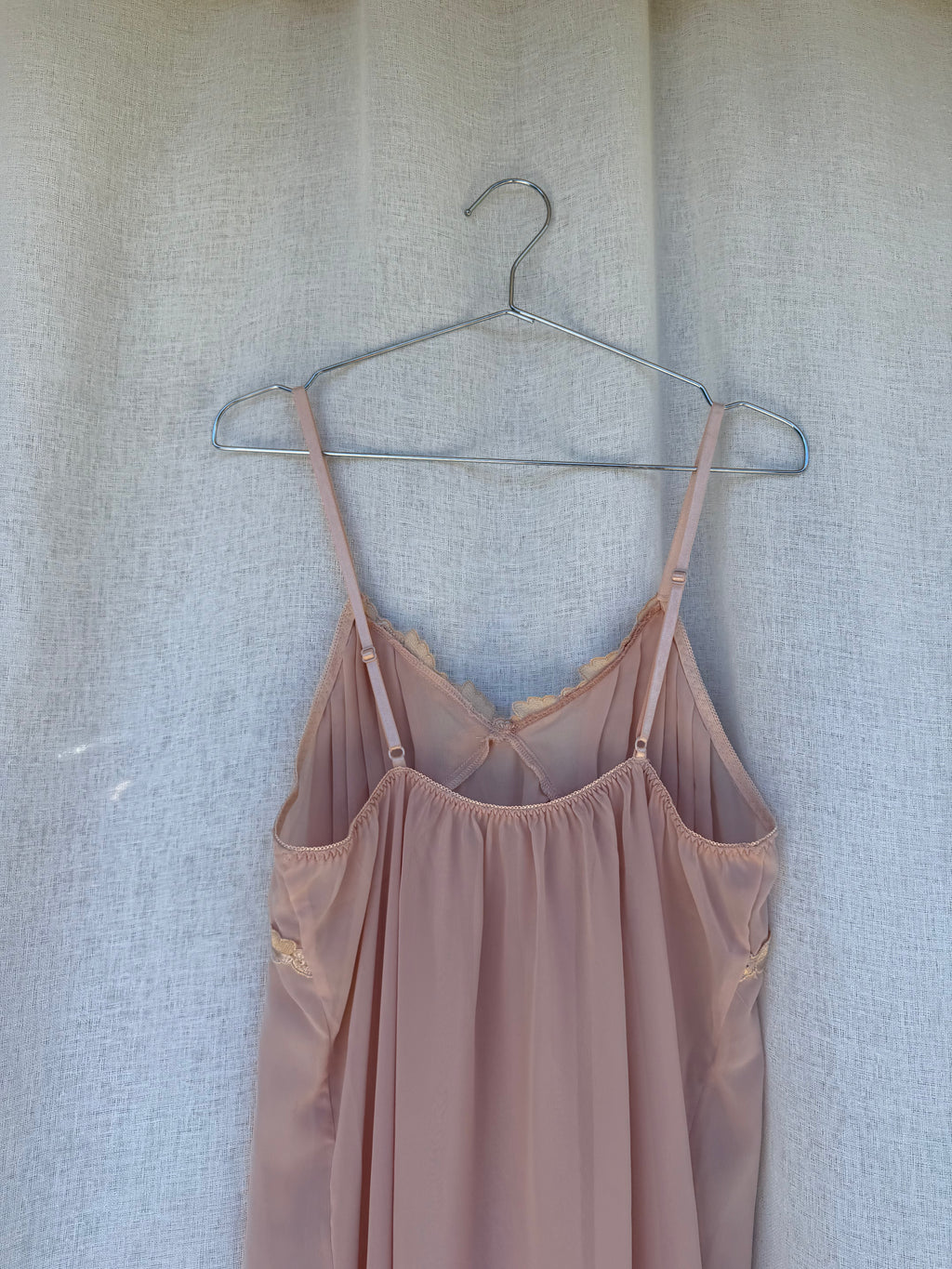Sheer dusty pink slip with leaf detail