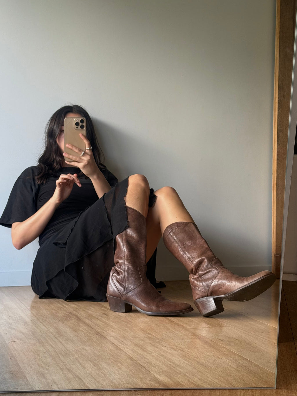 Brown leather cowboy boots