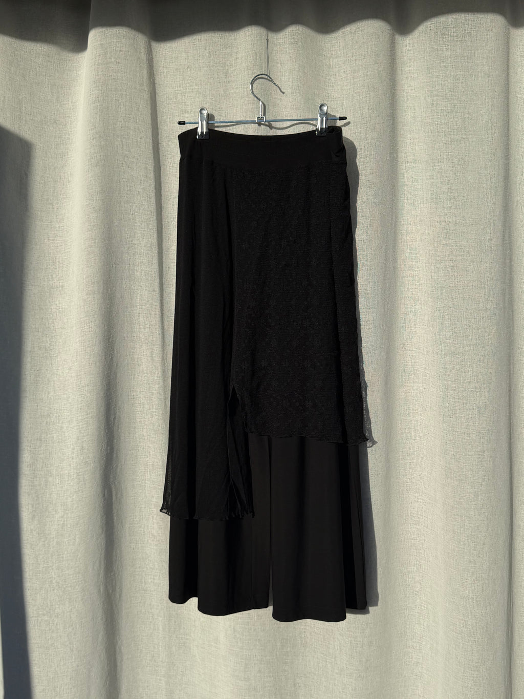 Black pants with lacy overskirt