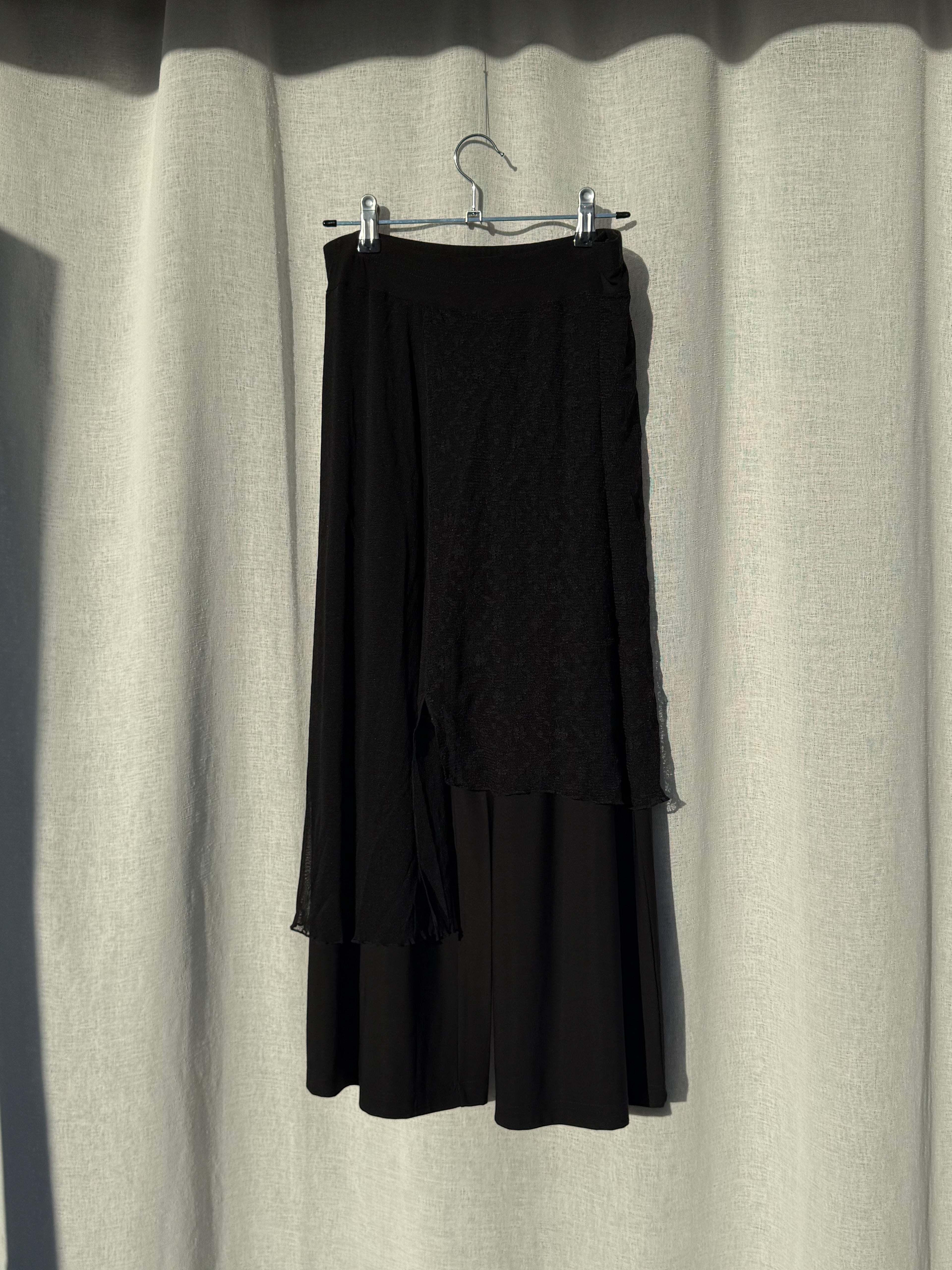 Black pants with lacy overskirt